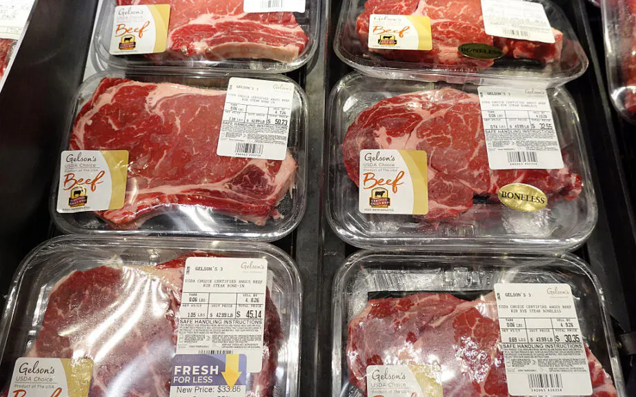 LOS ANGELES, CALIFORNIA - APRIL 06: Beef ribeye steaks are displayed at a grocery store on April 06, 2026 in Los Angeles, California. Amid persistently high food inflation, the price of a pound of ground beef has risen to between roughly $6.49 and $8.96, often exceeding the federal minimum wage of $7.25 an hour, as supply shortages, drought, and disease affecting cattle herds drive costs higher while wages remain unchanged since 2009. (Photo by Justin Sullivan/Getty Images)