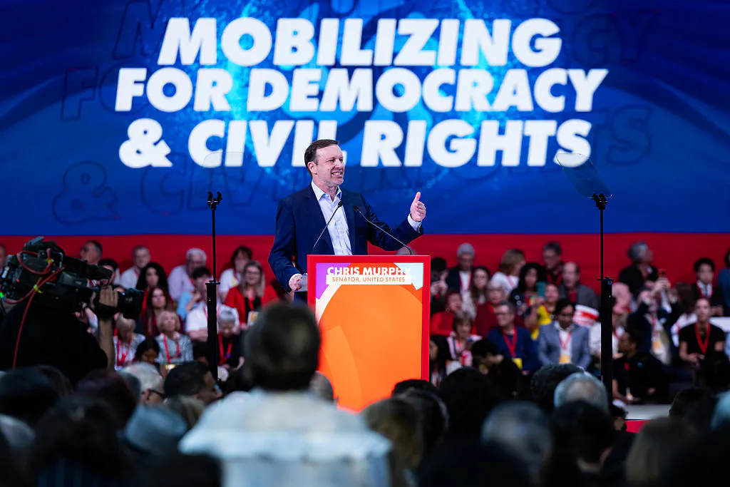 Chris Murphy and Tim Walz Cozy Up To Wannabe Tyrants At Communist Rally