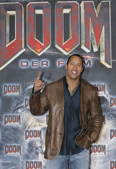 BERLIN - OCTOBER 24: Actor Dwayne 'The Rock' Johnson gestures during a photo call for his newest movie "Doom" on October 24, 2005 in Berlin, Germany (Photo by Andreas Rentz/Getty Images)