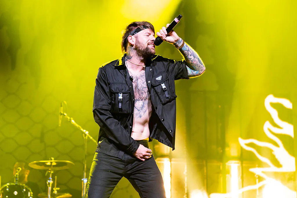 Rock Singer Comes Out As Gay And Wife Of 14 Years Reacts