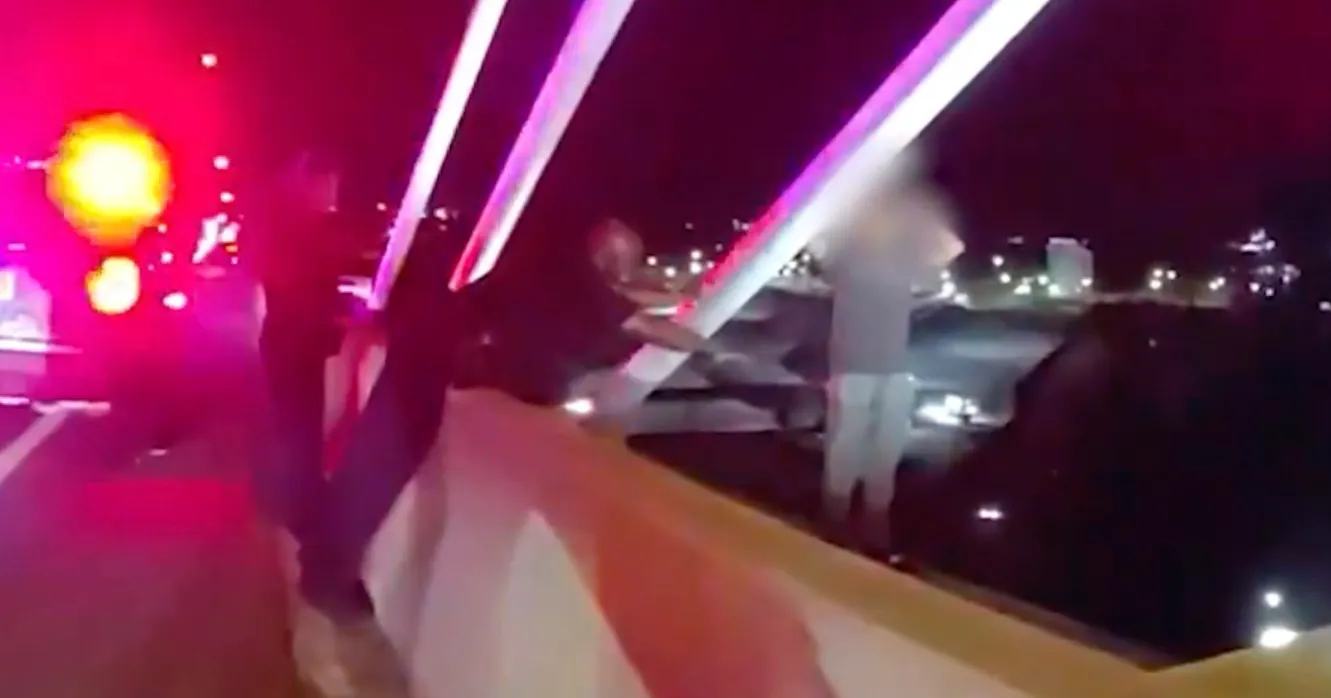 WATCH: Police Officer Leans On Prayer In Hour-Long Effort To Save Man On Bridge