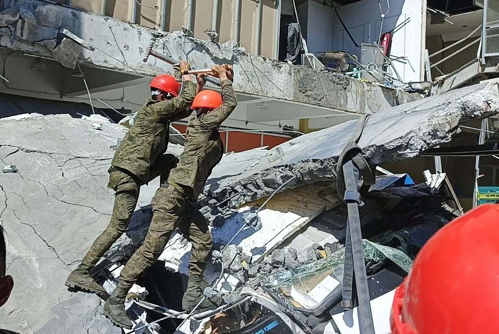 Dozens Dead After Massive Earthquake Triggers Tsunami Warnings