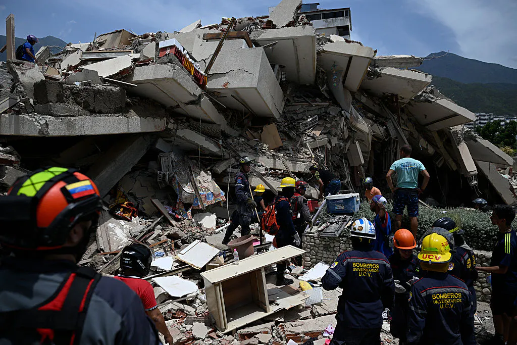 WATCH: Rescuers Pull Dog From Rubble As Earthquake Death Toll Rises