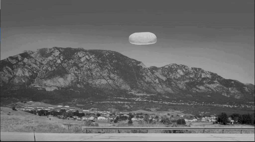 This image is an artistic interpretation of a 2022 incident potentially involving unidentified anomalous phenomena (UAP) reported near Colorado Springs, Colorado. This image is derived from the first-hand narrative description contained in “FBI-UAP-D002, FD-1057, Unresolved UAP Report, Colorado Springs, 2022”.