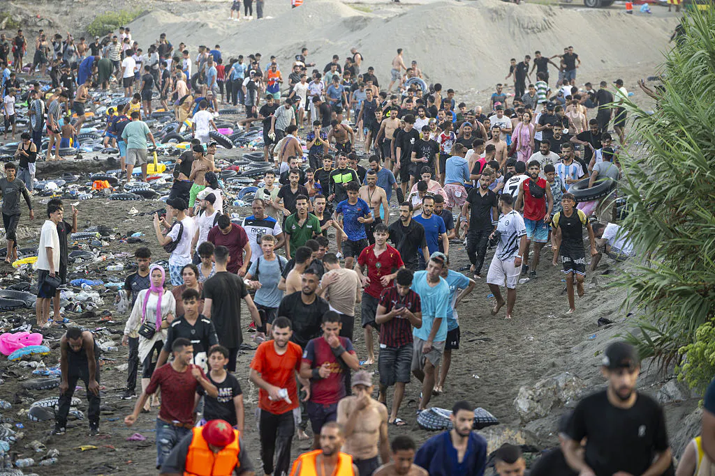 Why Did Nearly 60,000 African Migrants Storm Spain’s Beaches?