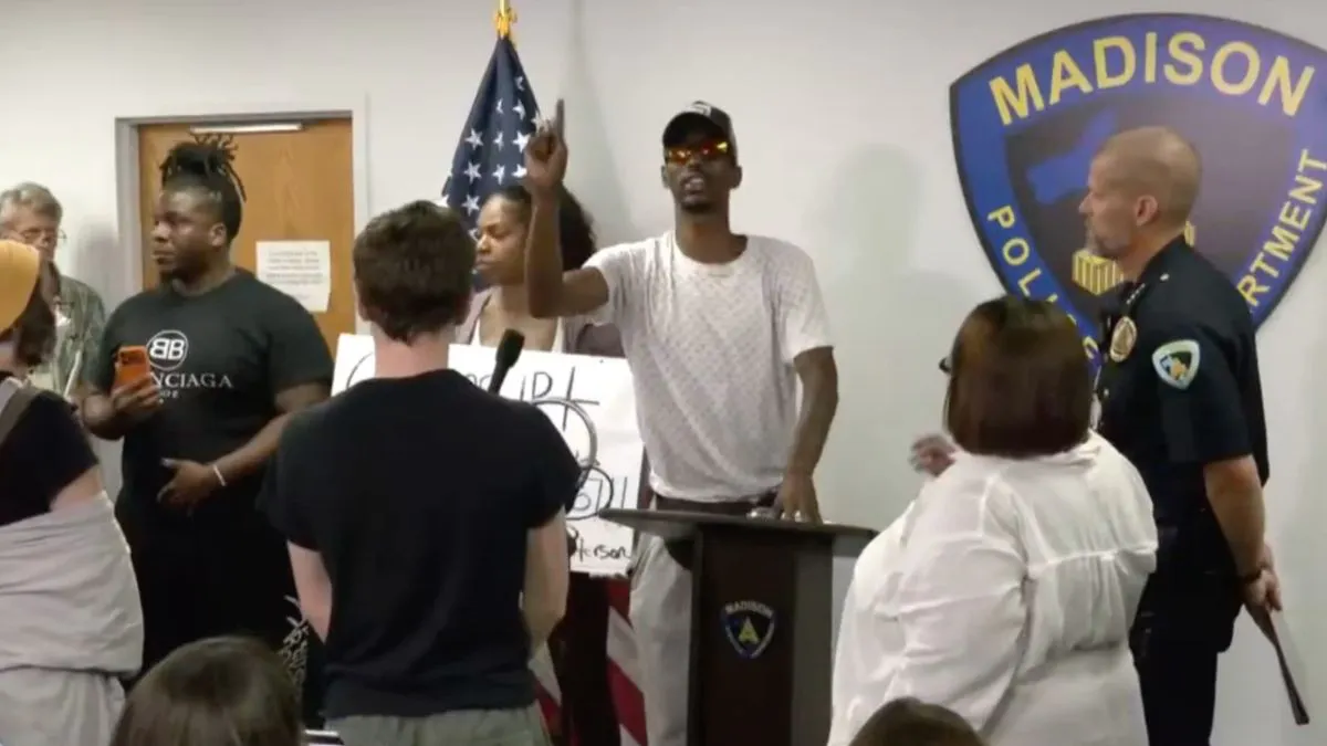Watch How Police React As Screaming Protester Takes Over Briefing On Fatal Shooting