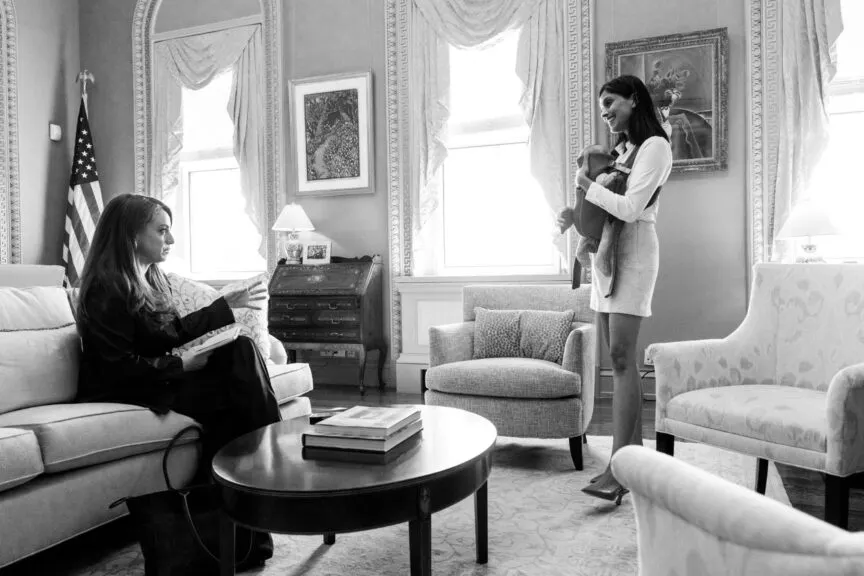 Usha Vance holds baby Alec Vance as she speaks with The Daily Wire's Mary Margaret Olohan. Photo credit: White House Photo Office.