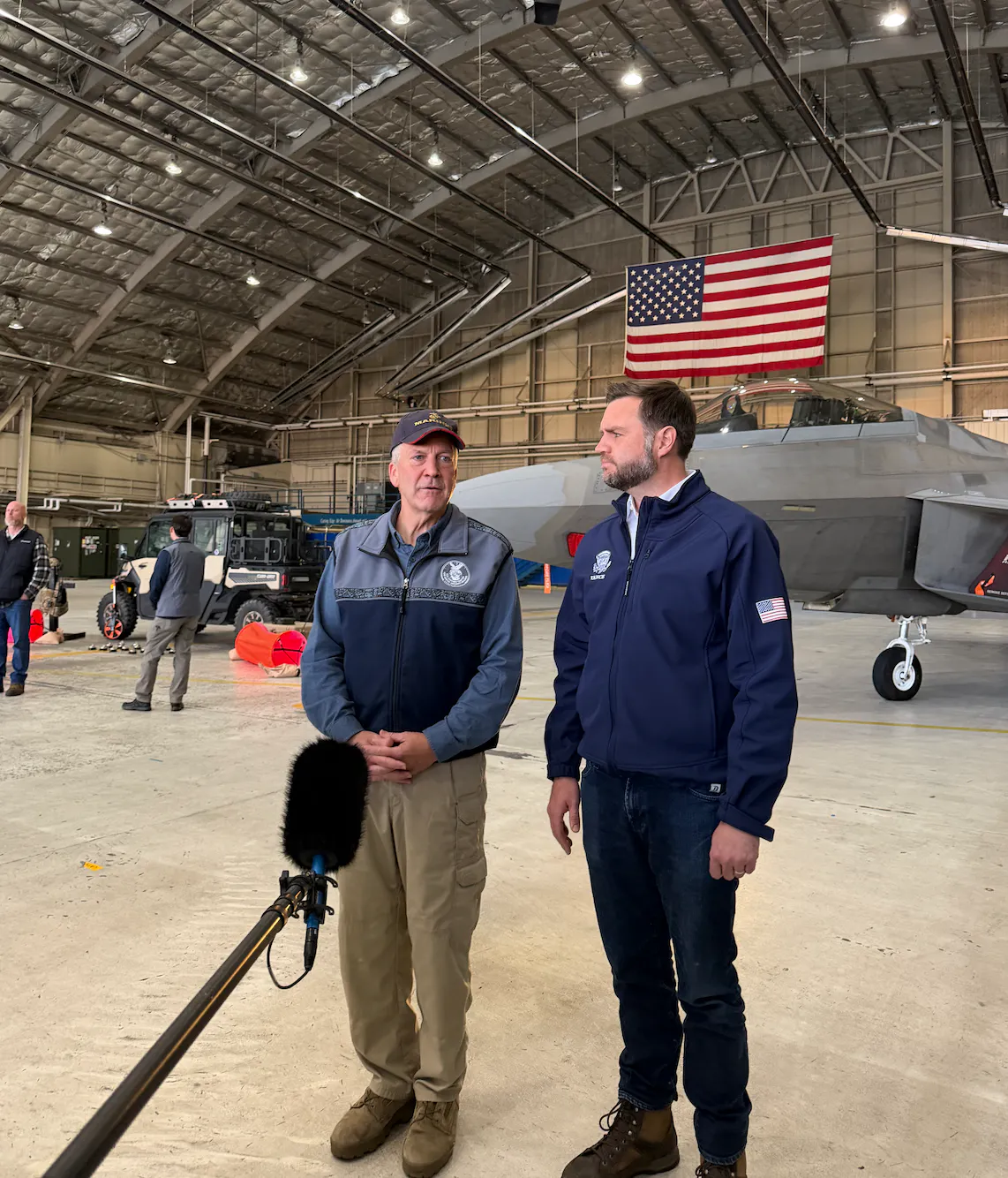 JD Vance and Dan Sullivan speak to reporters ahead of Vance's return to Washington, D.C. Photo: Mary Margaret Olohan for The Daily Wire. 